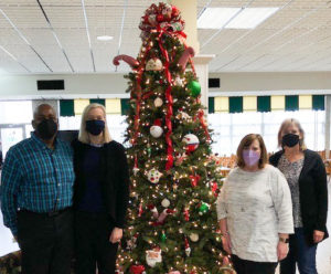 Group photo around Christmas Tree  